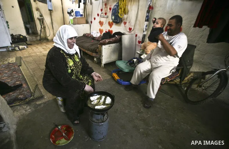 Palestinians refugee family in the Jabaliya refugee camp in the northern area of the Gaza Strip on 05 February 2012. Photo by Ali Jadallah