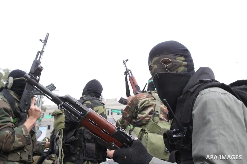 Members of Al-Qassam Brigades take part in a funeral for Hamas fighter in Gaza City, on Feb, 06. 2012. Photo by Mohammed Asad