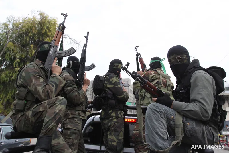 Members of Al-Qassam Brigades take part in a funeral for Hamas fighter in Gaza City, on Feb, 06. 2012. Photo by Mohammed Asad