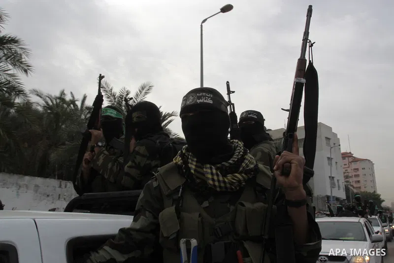 Members of Al-Qassam Brigades take part in a funeral for Hamas fighter in Gaza City, on Feb, 06. 2012. Photo by Mohammed Asad
