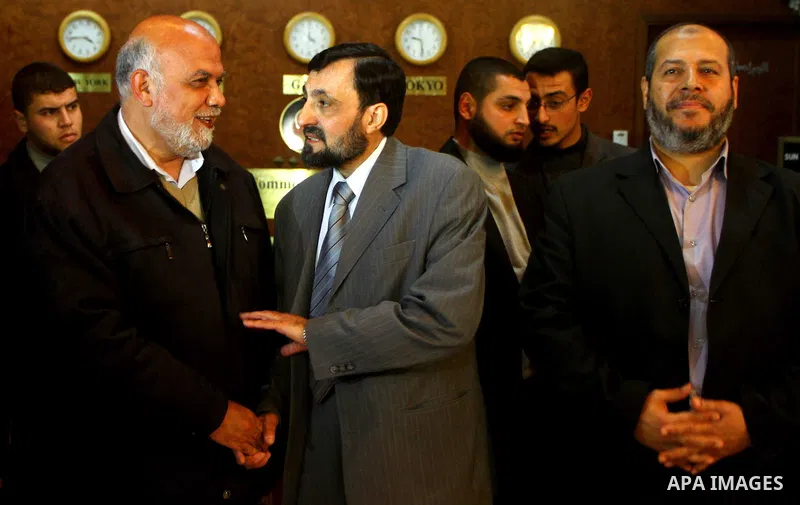 A Palestinian member of Hamas movement political bureau, Emad Al-Alami is welcomed by Hamas movement leaders and others after his arrival to Gaza Strip, in Gaza city on Feb. 6,2012. Al-Almi returned to Gaza Strip on Mond...