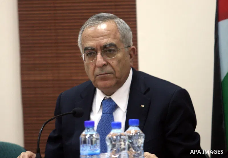Palestinian prime minister Salam Fayyad is seen on February 6, 2012, in the West Bank city of Ramallah after it was agreed that Palestinian president Mahmud Abbas is to head an interim consensus government under a deal s...