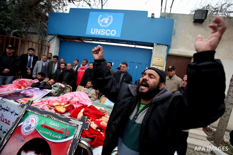 Palestinians on a hunger strike in solidarity with the prisoners in Israeli jails in front of the UN headquarters in Gaza City, on Feb. 07, 2012. Photo by Ashraf Amra