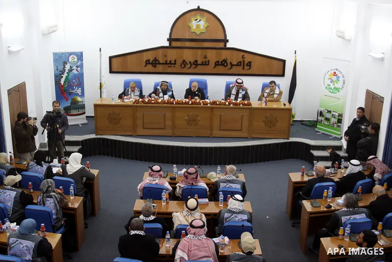 The spokesman of the Palestinian parliament, Ahmed Bahr meets with members of the "Miles of Smiles 9" aid convoy at the parliament headquarters in Gaza city on Feb. 07, 2012. The convoy, carrying medical aid for the Pale...