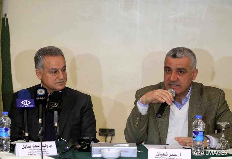 Foundation pal Thenik meets with Executive director of electricity company Walid Saad Sayel, during conference press in Gaza City, On Feb. 08, 2012. Photo by Mohammed Asad