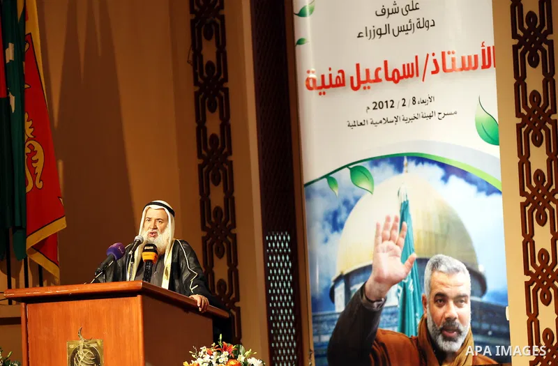 Official Kuwaiti receives The Hamas prime minister in Gaza, Ismail Haniya during attends a ceremony honouring him at the International Islamic Charitable Organization in Kuwait City on February 8, 2012. Photo by Mohammed...