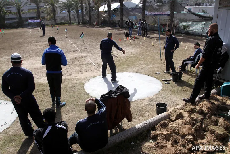 Disabled Palestinians participate in an athletics championship for disabled , in Gaza city on Feb. 09, 2012. Photo by Mohammed Asad