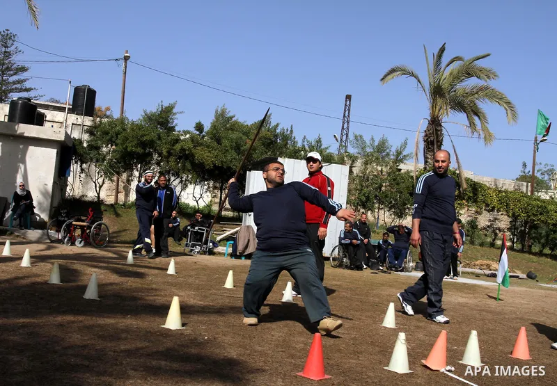 Disabled Palestinians participate in an athletics championship for disabled , in Gaza city on Feb. 09, 2012. Photo by Mohammed Asad