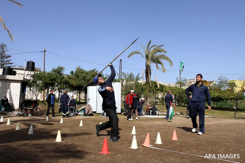 Disabled Palestinians participate in an athletics championship for disabled , in Gaza city on Feb. 09, 2012. Photo by Mohammed Asad