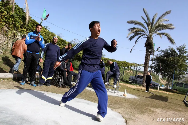 Disabled Palestinians participate in an athletics championship for disabled , in Gaza city on Feb. 09, 2012. Photo by Mohammed Asad