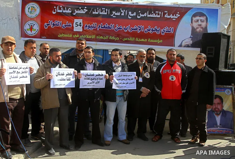 Palestinians protest of prisoner Khader Adnan, who has been on hunger strike since December 18 while being held in an Israeli jail, in Gaza city on Feb. 09, 2012. Photo by Ashraf Amra