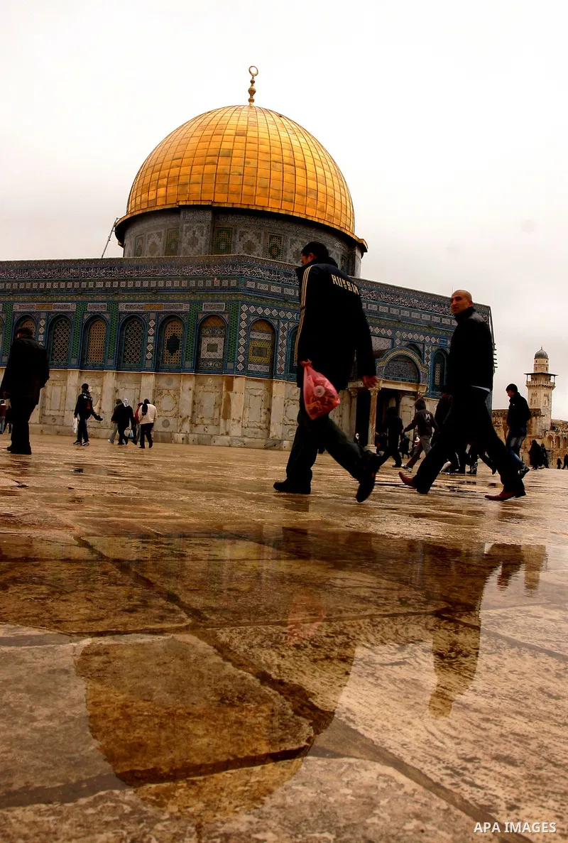 Palestinians attend Friday prayers at the Al-Aqsa Mosque compound in Jerusalem's Old City on February 10, 2012. Photo by Mahfouz Abu Turk