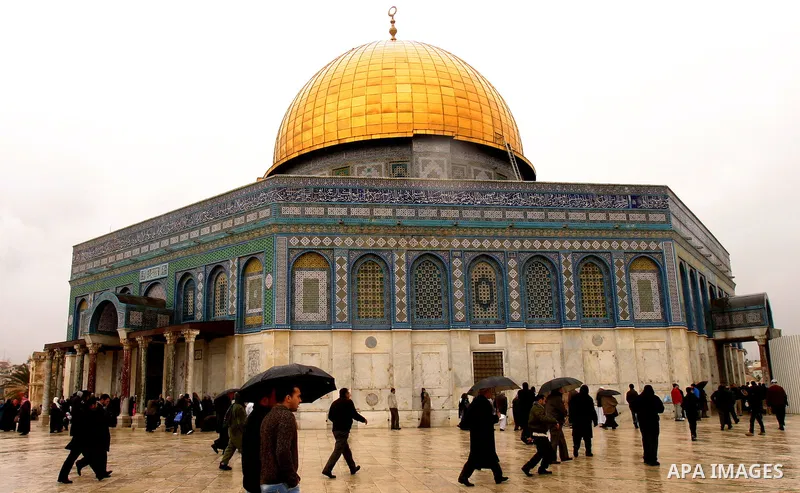 Palestinians attend Friday prayers at the Al-Aqsa Mosque compound in Jerusalem's Old City on February 10, 2012. Photo by Mahfouz Abu Turk