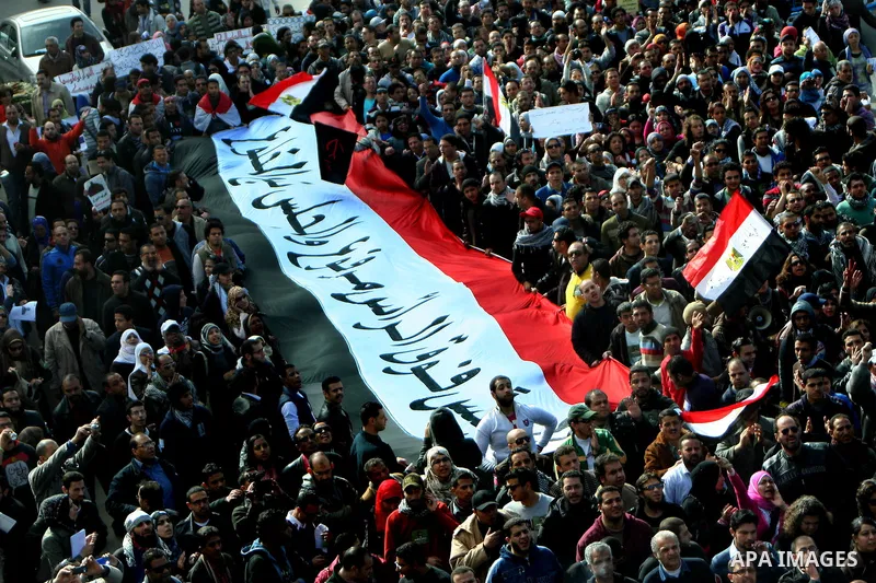 Demonstrators take part in a protest demanding that the army to hand power over to civilians, near the defence ministry in Cairo February 10, 2012. Egypt's religious authorities called on unions and youth groups to scrap...