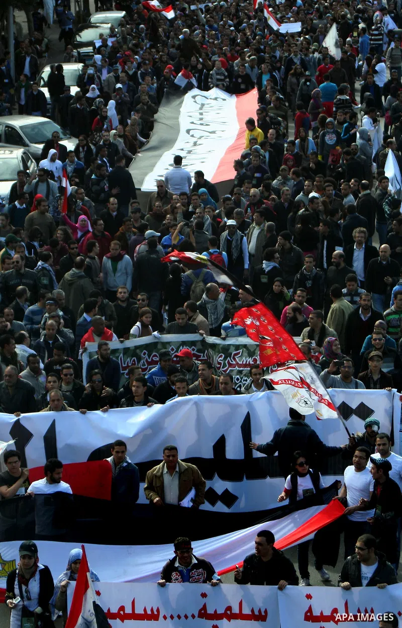 Demonstrators take part in a protest demanding that the army to hand power over to civilians, near the defence ministry in Cairo February 10, 2012. Egypt's religious authorities called on unions and youth groups to scrap...