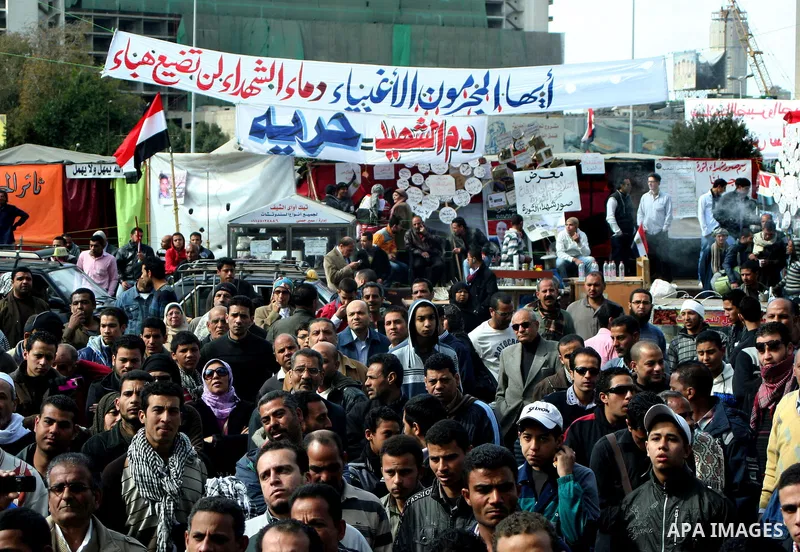 Demonstrators take part in a protest demanding that the army to hand power over to civilians, near the defence ministry in Cairo February 10, 2012. Egypt's religious authorities called on unions and youth groups to scrap...