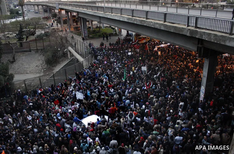 Demonstrators take part in a protest demanding that the army to hand power over to civilians, near the defence ministry in Cairo February 10, 2012. Egypt's religious authorities called on unions and youth groups to scrap...
