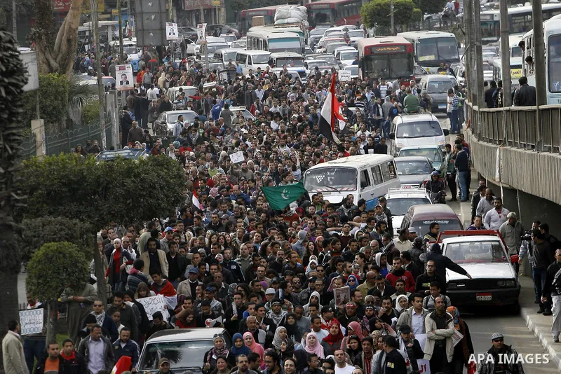 Demonstrators take part in a protest demanding that the army to hand power over to civilians, near the defence ministry in Cairo February 10, 2012. Egypt's religious authorities called on unions and youth groups to scrap...