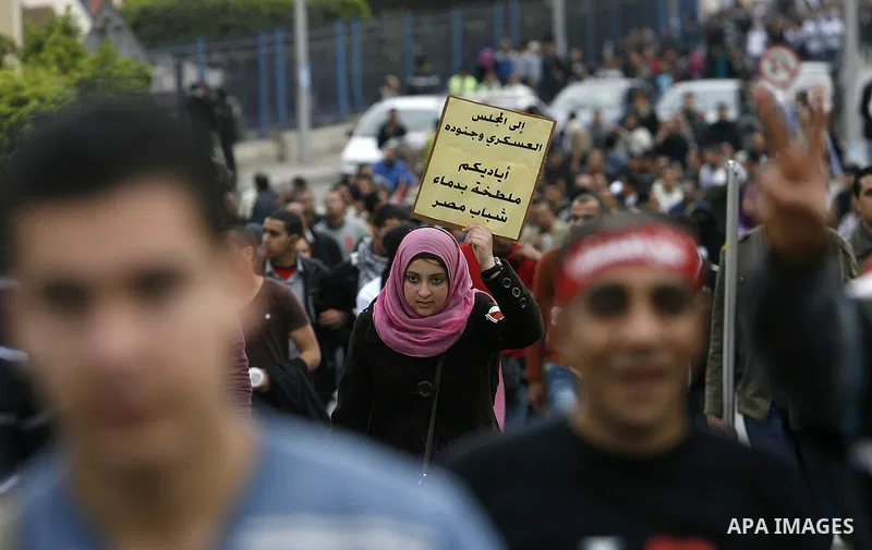 Demonstrators take part in a protest demanding that the army to hand power over to civilians, near the defence ministry in Cairo February 10, 2012. Egypt's religious authorities called on unions and youth groups to scrap...