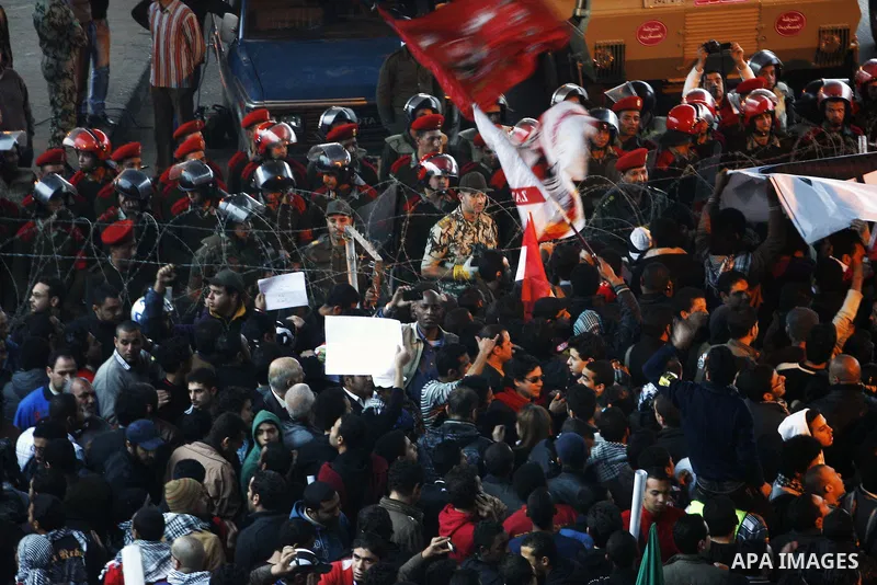 Demonstrators take part in a protest demanding that the army to hand power over to civilians, near the defence ministry in Cairo February 10, 2012. Egypt's religious authorities called on unions and youth groups to scrap...