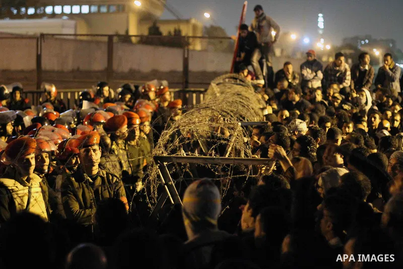 Demonstrators take part in a protest demanding that the army to hand power over to civilians, near the defence ministry in Cairo February 10, 2012. Egypt's religious authorities called on unions and youth groups to scrap...