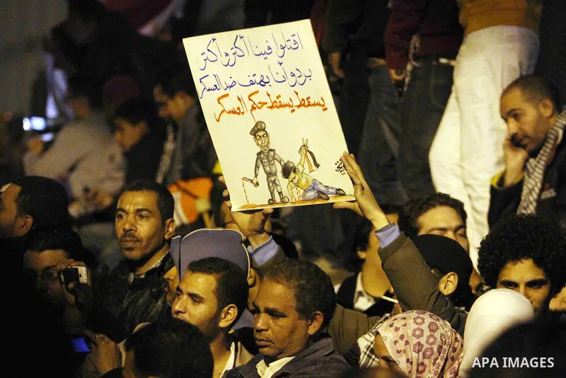 Demonstrators take part in a protest demanding that the army to hand power over to civilians, near the defence ministry in Cairo February 10, 2012. Egypt's religious authorities called on unions and youth groups to scrap...