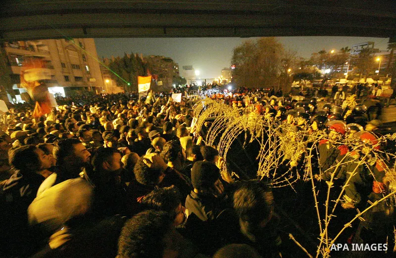 Demonstrators take part in a protest demanding that the army to hand power over to civilians, near the defence ministry in Cairo February 10, 2012. Egypt's religious authorities called on unions and youth groups to scrap...