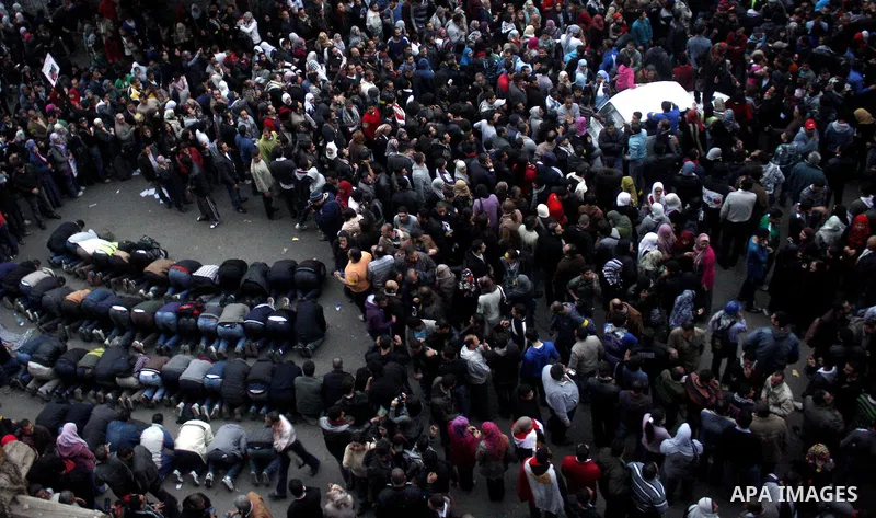 Small crowds still meet in Tahrir square for Friday prayer, followed by meetings remembering Al Alhy soccer team's bloody event last week in Port Said. Egypt. Photo by Osama Hamamm