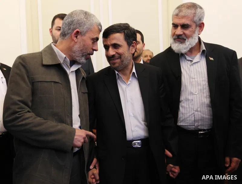 Iranian president Mahmoud Ahmadinejad welcomes the prime minister of the Gaza strip and leading member of the Hamas movement, Ismail Haniyeh at the presidential office in Tehran, Iran, 12 February 2012. Haniyeh arrived o...