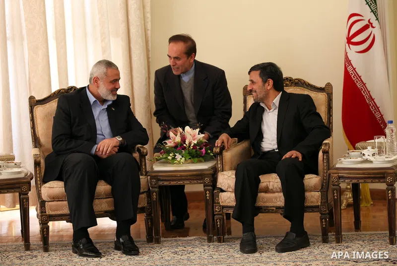 Iranian president Mahmoud Ahmadinejad welcomes the prime minister of the Gaza strip and leading member of the Hamas movement, Ismail Haniyeh at the presidential office in Tehran, Iran, 12 February 2012. Haniyeh arrived o...