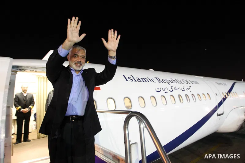 Iranian president Mahmoud Ahmadinejad welcomes the prime minister of the Gaza strip and leading member of the Hamas movement, Ismail Haniyeh at the presidential office in Tehran, Iran, 12 February 2012. Haniyeh arrived o...