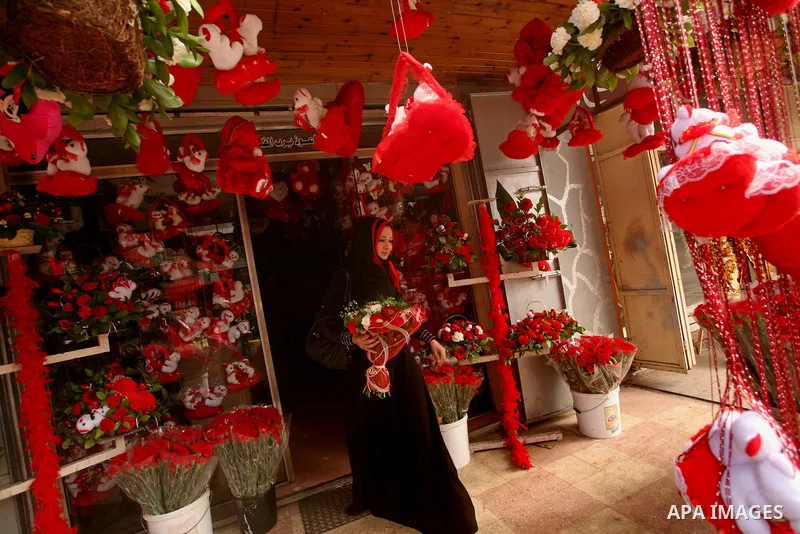 Palestinian woman are buying the hearts of love in the shop during the Valentine's Day in Gaza City on Feb. 14, 2012. Valentine's Day is celebrated each year on 14 February. Photo by Ashraf Amra