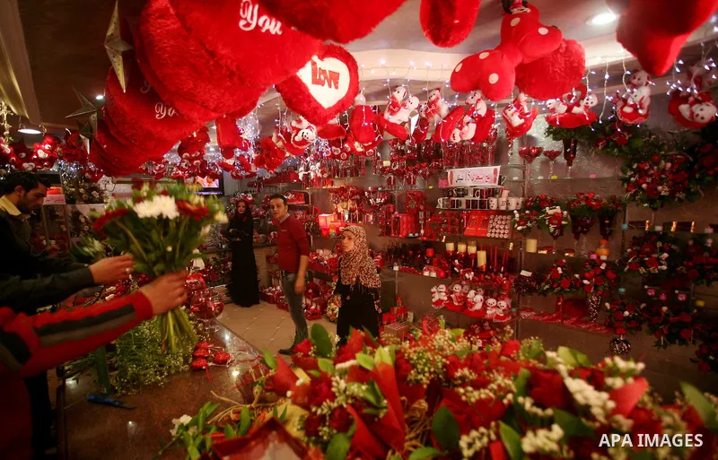 Palestinian woman are buying the hearts of love in the shop during the Valentine's Day in Gaza City on Feb. 14, 2012. Valentine's Day is celebrated each year on 14 February. Photo by Ashraf Amra
