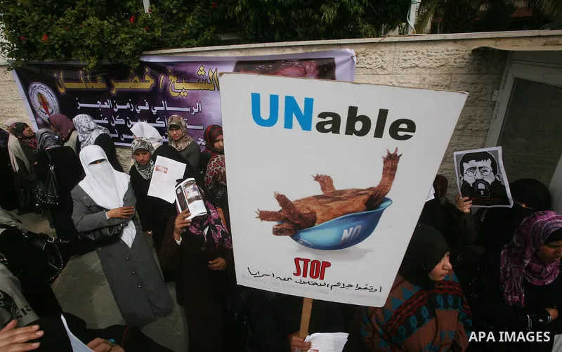Palestinians,take part in a protest in front of French Center calling for release of Palestinian prisoner Khader Adnan, a member of the Islamic Jihad militant group, in Gaza City, February 14, 2012. Adnan has been on hun...