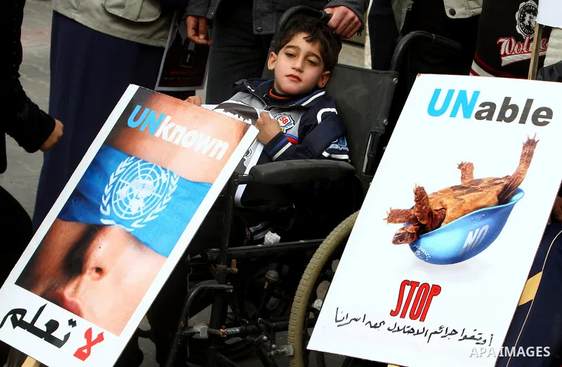 Palestinians,take part in a protest in front of French Center calling for release of Palestinian prisoner Khader Adnan, a member of the Islamic Jihad militant group, in Gaza City, February 14, 2012. Adnan has been on hun...