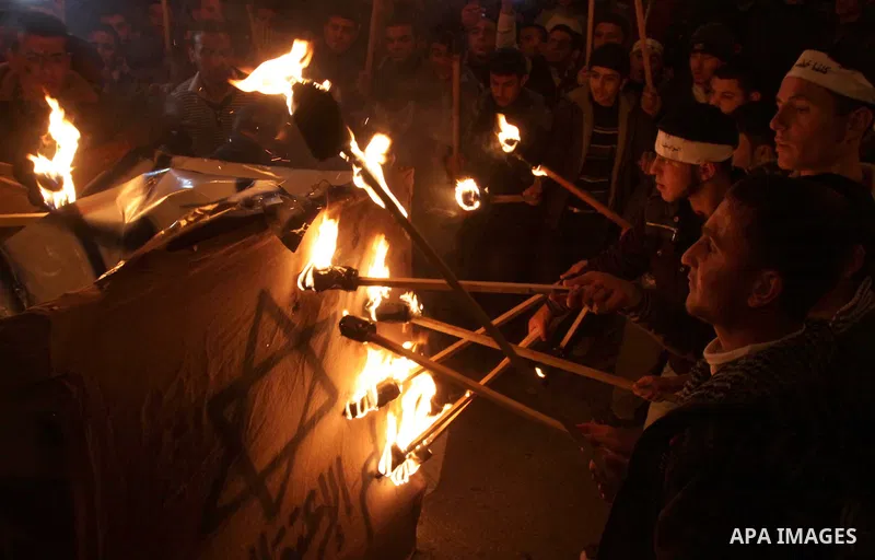 Palestinians participate in a protest in solidarity with Khader Adnan, 33, a senior member of Islamic Jihad jailed in Israel who has been on hunger strike for 59 days as they called for the release of Palestinian prisone...