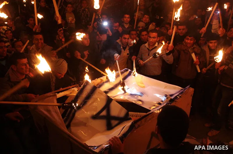 Palestinians participate in a protest in solidarity with Khader Adnan, 33, a senior member of Islamic Jihad jailed in Israel who has been on hunger strike for 59 days as they called for the release of Palestinian prisone...