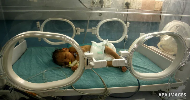 Premature babies receive treatment in the Nasser hospital in Khan Younis, southern Gaza Strip on February 15, 2012 as the hospital suffer from running out of fuel. Palestinian Ministry of Health in Gaza, calls for the Ar...