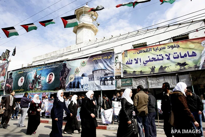 Palestinian students participate in a protest in solidarity with Khader Adnan, 33, a jailed senior member of Islamic Jihad who has been on hunger strike for nearly 60 days days as they called for the release of Palestini...