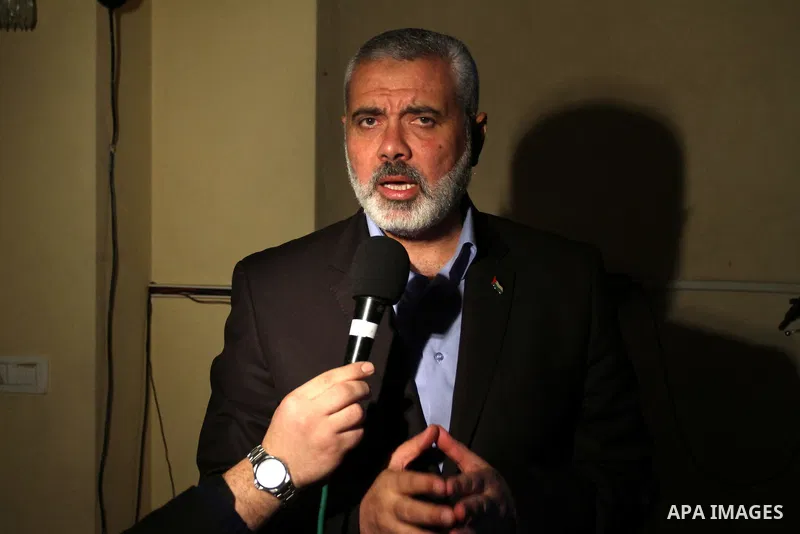 Palestinian prime minister in Gaza Strip, Ismail Haniyah speaks to Palestinians, in Gaza city on Feb. 16,2012 after his arrival to Gaza Strip from a tour to Qatar, Bahrain, Kuwait, Iran and U.A.E. Photo by Mohammed Asad