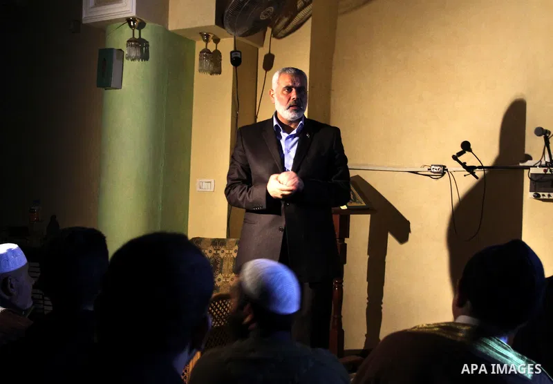 Palestinian prime minister in Gaza Strip, Ismail Haniyah speaks to Palestinians, in Gaza city on Feb. 16,2012 after his arrival to Gaza Strip from a tour to Qatar, Bahrain, Kuwait, Iran and U.A.E. Photo by Mohammed Asad