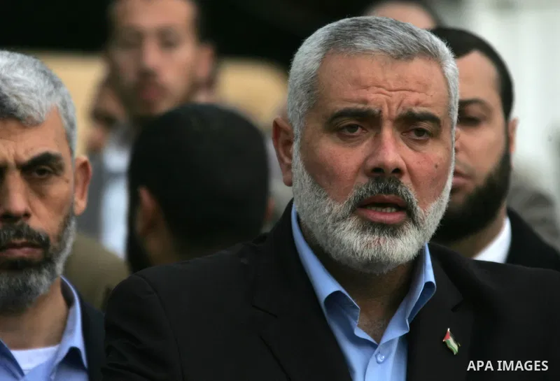 Palestinian Prime Minister in Gaza Strip, Ismail Haniyeh arrives to the Gaza Strip through Rafah border crossing between the Gaza Strip and Egypt ,Thursday, Feb. 16, 2012. Haniyeh's trip included a visit to Iran where he...