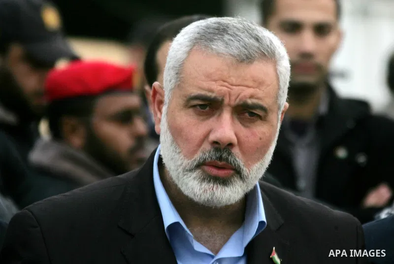 Palestinian Prime Minister in Gaza Strip, Ismail Haniyeh arrives to the Gaza Strip through Rafah border crossing between the Gaza Strip and Egypt ,Thursday, Feb. 16, 2012. Haniyeh's trip included a visit to Iran where he...