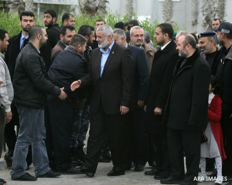 Palestinian Prime Minister in Gaza Strip, Ismail Haniyeh arrives to the Gaza Strip through Rafah border crossing between the Gaza Strip and Egypt ,Thursday, Feb. 16, 2012. Haniyeh's trip included a visit to Iran where he...