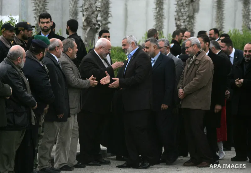 Palestinian Prime Minister in Gaza Strip, Ismail Haniyeh arrives to the Gaza Strip through Rafah border crossing between the Gaza Strip and Egypt ,Thursday, Feb. 16, 2012. Haniyeh's trip included a visit to Iran where he...
