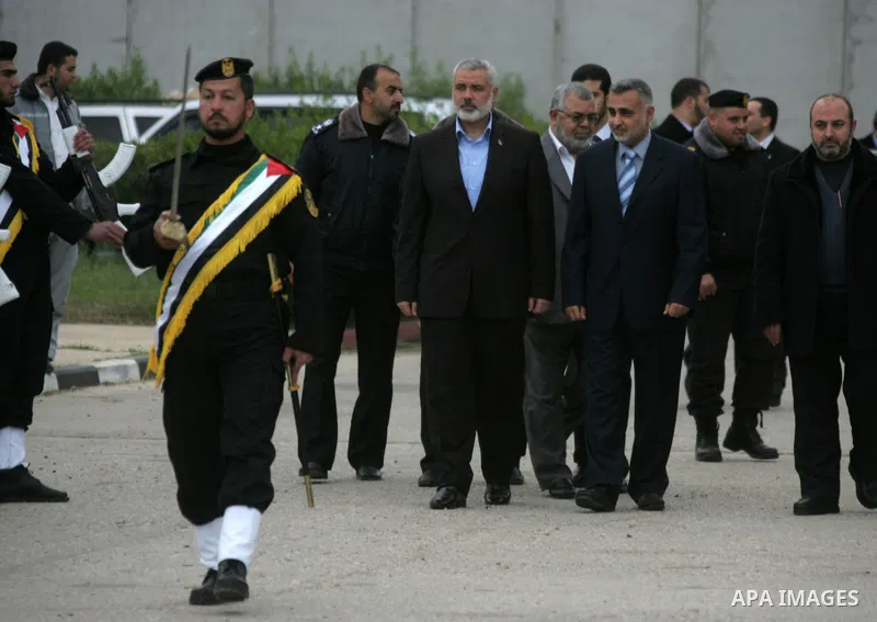 Palestinian Prime Minister in Gaza Strip, Ismail Haniyeh arrives to the Gaza Strip through Rafah border crossing between the Gaza Strip and Egypt ,Thursday, Feb. 16, 2012. Haniyeh's trip included a visit to Iran where he...