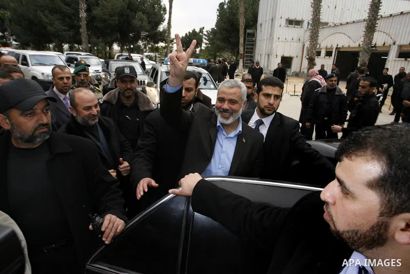 Palestinian Prime Minister in Gaza Strip, Ismail Haniyeh arrives to the Gaza Strip through Rafah border crossing between the Gaza Strip and Egypt ,Thursday, Feb. 16, 2012. Haniyeh's trip included a visit to Iran where he...