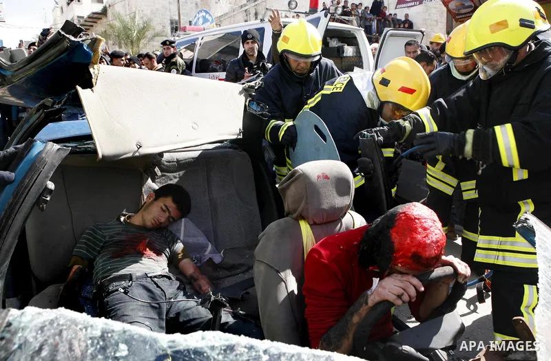 Palestinian firefighters take part in an earthquake drill organised by the civil defence forces in the West Bank city of Jenin on February 16, 2012. Photo by Wagdi Eshtayah
