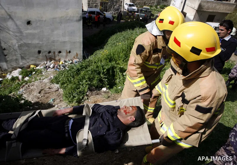 Palestinian firefighters take part in an earthquake drill organised by the civil defence forces in the West Bank city of Jenin on February 16, 2012. Photo by Wagdi Eshtayah
