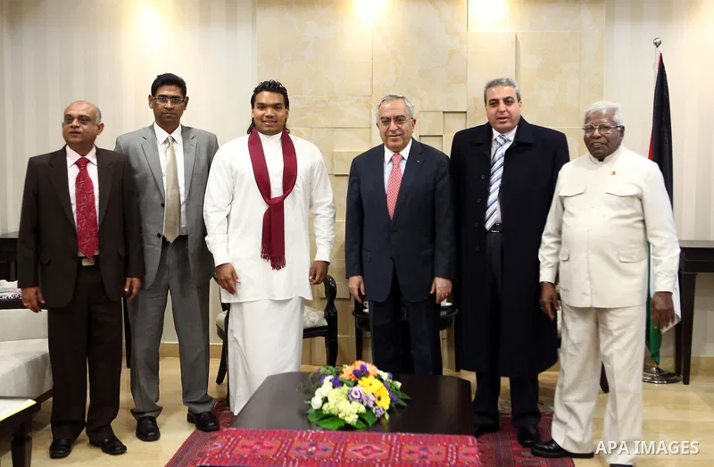 Palestinian Prime Minister, Salam Fayyad meets with presidential envoy on Sri Lanka, Namal Rajpxh, in the West Bank city of Ramallah on Feb, 19, 2012. photo by Mustafa Abu Dayeh.
